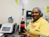 A normal day of work Elma completing a quality check before distributing the Coke product to customers