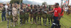 Photo Courtesy of CCEP A singsing group being refreshed by Coke and Natures Own Water at the Goroka Show shared by a CCEP staff